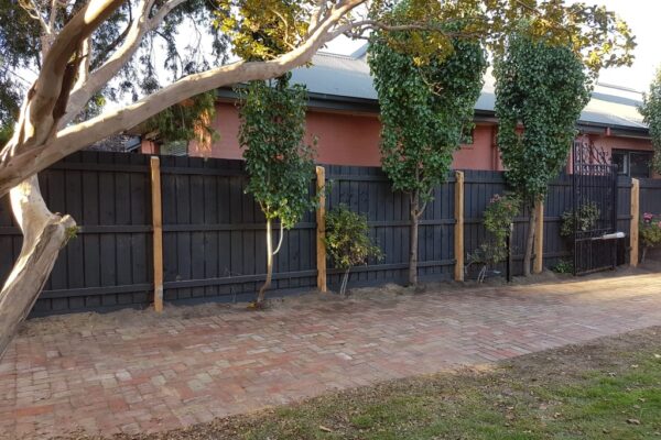 black timber fence by easy fixed